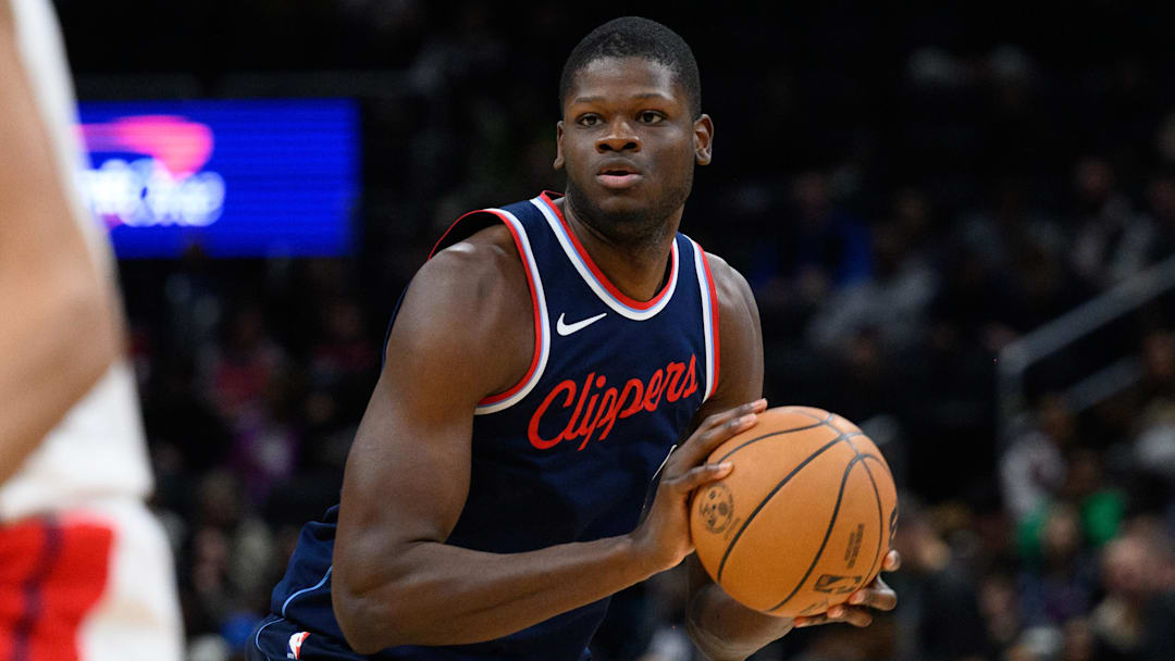 Nov 27, 2024; Washington, District of Columbia, USA; LA Clippers center Mo Bamba (4) looks to pass the ball during the fourth quarter against the Washington Wizards at Capital One Arena. Mandatory Credit: Reggie Hildred-Imagn Images