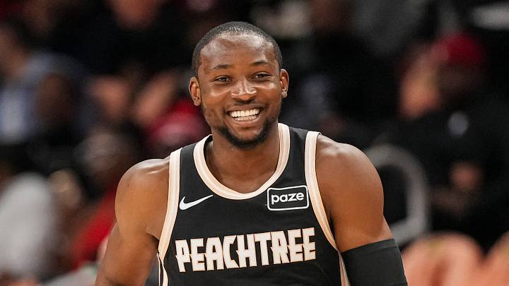 Feb 26, 2026; Atlanta, Georgia, USA; Atlanta Hawks forward Jonathan Kuminga (0) reacts after making a three point shot against the Washington Wizards during the first half at State Farm Arena. Mandatory Credit: Dale Zanine-Imagn Images