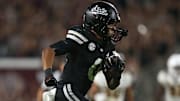 Mississippi State Bulldogs wide receiver Brenen Thompson (0) runs after a catch for a touchdown during the fourth quarter against the Arizona State Sun Devils at Davis Wade Stadium at Scott Field.
