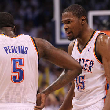 Jun 2, 2012; Oklahoma City, OK, USA; Oklahoma City Thunder forward Kevin Durant (35) celebrates with center Kendrick Perkins (5) in the fourth quarter against the San Antonio Spurs in game four of the Western Conference finals of the 2012 NBA playoffs at Chesapeake Energy Arena. The Thunder beat the Spurs 109-103. Mandatory Credit: Matthew Emmons-Imagn Images