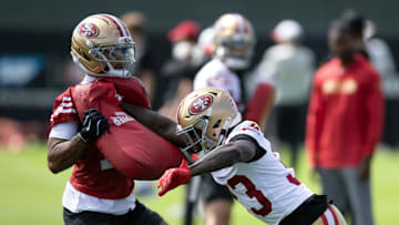 San Francisco 49ers wide receiver Jordan Watkins (17) and defensive back Siran Neal (33)