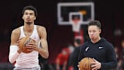 Nov 6, 2024; Houston, Texas, USA; San Antonio Spurs center Victor Wembanyama (1) practices free throws as interim head coach Mitch Johnson looks on before the game against the Houston Rockets at Toyota Center. Mandatory Credit: Troy Taormina-Imagn Images