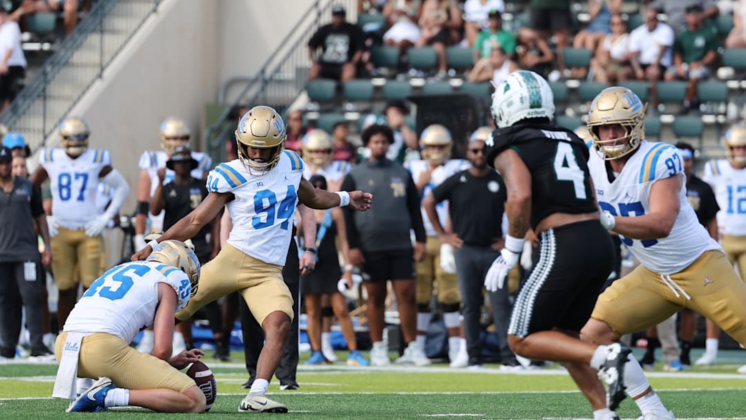 Aug 31, 2024; Honolulu, Hawaii, USA; UCLA Bruins place kicker Mateen Bhaghani (94) makes a field goal against the Hawaii Rainbow Warriors during the third quarter of an NCAA college football game against the UCLA Bruins at the Clarence T.C. Ching Athletics Complex. Mandatory Credit: Marco Garcia-Imagn Images