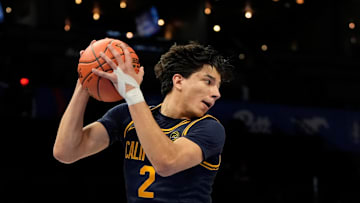 Mar 11, 2025; Charlotte, NC, USA; California Golden Bears guard Andrej Stojakovic (2) grabs a rebound in the first half at Spectrum Center. Mandatory Credit: Bob Donnan-Imagn Images
