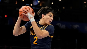 Mar 11, 2025; Charlotte, NC, USA; California Golden Bears guard Andrej Stojakovic (2) grabs a rebound in the first half at Spectrum Center. Mandatory Credit: Bob Donnan-Imagn Images
