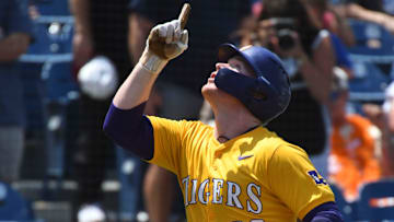 May 26 2024; Hoover, AL, USA; LSU batter Jared Jones (22) gestures heavenward as he enjoys his home run trot after hitting a solo shot to left against Tennessee at the Hoover Met during the championship game of the SEC Tournament.