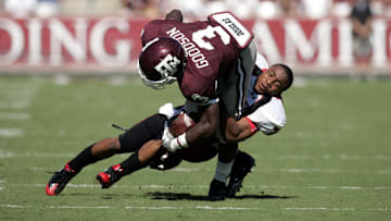Oct 18, 2007; College Station, TX, USA; Texas Tech Red Raiders safety Darcel McBath (7) tackles Texas A&M Aggies Texas A&M running back Mike Goodson (3) in the first quarter at Kyle Field. Mandatory Credit: Brett Davis-Imagn Images