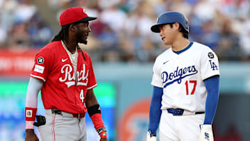 Shohei Ohtani and the defending champion Dodgers will begin their title defense against the upstart Reds on Tuesday