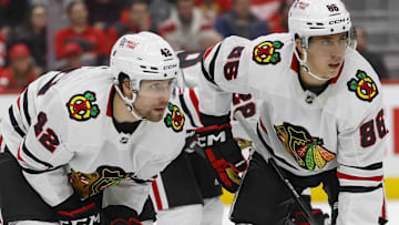 Jan 10, 2025; Detroit, Michigan, USA; Chicago Blackhawks defenseman Nolan Allan (42) and center Teuvo Teravainen (86) look on during the second period at Little Caesars Arena. Mandatory Credit: Brian Bradshaw Sevald-Imagn Images