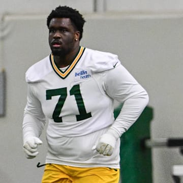 Green Bay Packers offensive tackle Anthony Belton (71) participates in the team's minicamp.