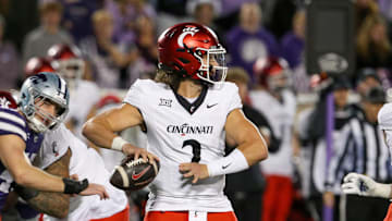 Nov 23, 2024; Manhattan, Kansas, USA; Cincinnati Bearcats quarterback Brendan Sorsby (2) drops back to pass during the fourth quarter against the Kansas State Wildcats at Bill Snyder Family Football Stadium. Mandatory Credit: Scott Sewell-Imagn Images