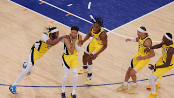 May 21, 2025; New York, New York, USA; Indiana Pacers guard Tyrese Haliburton (0) celebrates with teammates after tying the game in the fourth quarter to send the game to overtime against the New York Knicks during game one of the eastern conference finals for the 2025 NBA Playoffs at Madison Square Garden. Mandatory Credit: Brad Penner-Imagn Images