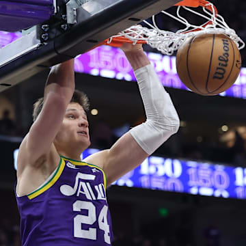 Dec 13, 2023; Salt Lake City, Utah, USA; Utah Jazz center Walker Kessler (24) dunks the ball against the New York Knicks during the third quarter at Delta Center. Mandatory Credit: Rob Gray-Imagn Images