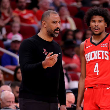 Mar 25, 2024; Houston, Texas, USA; Houston Rockets head coach Ime Udoka talks with guard Jalen Green (4) during the first quarter against the Portland Trail Blazers at Toyota Center. Mandatory Credit: Erik Williams-USA TODAY Sports