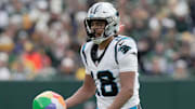 Carolina Panthers wide receiver Jalen Coker (18) grabs a beach ball; that blew onto the field during the second quarter of their game against the Green Bay Packers Sunday, November 2, 2025 at Lambeau Field in Green Bay, Wisconsin.