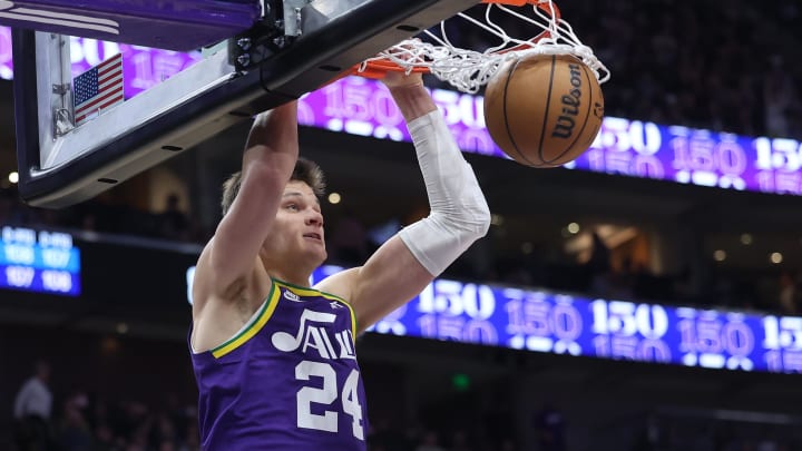 Dec 13, 2023; Salt Lake City, Utah, USA; Utah Jazz center Walker Kessler (24) dunks the ball against the New York Knicks during the third quarter at Delta Center. Mandatory Credit: Rob Gray-USA TODAY Sports