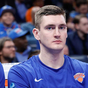 Dec 27, 2023; Oklahoma City, Oklahoma, USA; New York Knicks Dmytro Skapintsev sits on the bench during the second half against the Oklahoma City Thunder at Paycom Center. Mandatory Credit: Alonzo Adams-Imagn Images