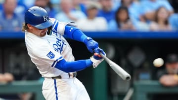 Jul 23, 2024; Kansas City, Missouri, USA; Kansas City Royals shortstop Bobby Witt Jr. (7) hits an RBI double during the first inning against the Arizona Diamondbacks at Kauffman Stadium.