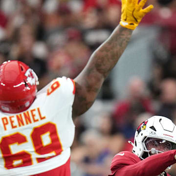 Arizona Cardinals quarterback Kyler Murray throws the ball as Kansas City Chiefs nose tackle Mike Pennel (69) defends during their preseason game at State Farm Stadium on Aug. 9, 2025.