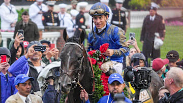 Jockey Junior Alvarado with Sovereignty head to the Winner's Circle after the pair won the 2025 Kentucky Derby.