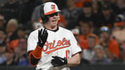 May 1, 2024; Baltimore, Maryland, USA;  Baltimore Orioles outfielder Heston Kjerstad (13) reacts after being hit with a eighth inning pitch against the New York Yankees at Oriole Park at Camden Yards