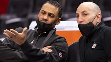 Feb 10, 2022; Detroit, Michigan, USA; Detroit Pistons general manager Troy Weaver (left): Raj Mehta-Imagn Images