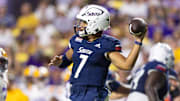 Sep 28, 2024; Baton Rouge, Louisiana, USA;  South Alabama Jaguars quarterback Gio Lopez (7) throws against the LSU Tigers during the second quarter at Tiger Stadium. Mandatory Credit: Stephen Lew-Imagn Images