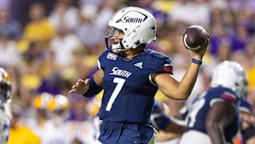 Sep 28, 2024; Baton Rouge, Louisiana, USA;  South Alabama Jaguars quarterback Gio Lopez (7) throws against the LSU Tigers during the second quarter at Tiger Stadium. Mandatory Credit: Stephen Lew-Imagn Images