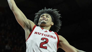 Feb 23, 2025; Piscataway, New Jersey, USA; Rutgers Scarlet Knights guard Dylan Harper (2) dunks the ball during the second half against the USC Trojans at Jersey Mike's Arena. Mandatory Credit: John Jones-Imagn Images