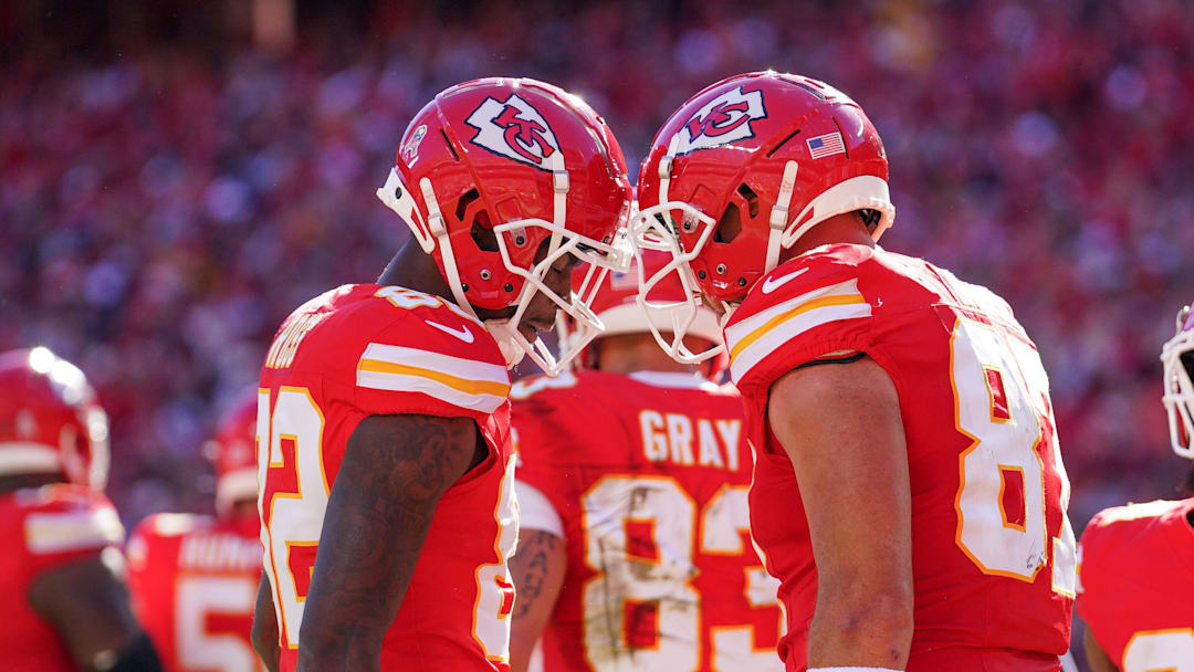 Nov 10, 2024; Kansas City, Missouri, USA; Kansas City Chiefs tight end Travis Kelce (87) celebrates with wide receiver Justyn Ross (82) after scoring against the Denver Broncos during the game at GEHA Field at Arrowhead Stadium. Mandatory Credit: Denny Medley-Imagn Images