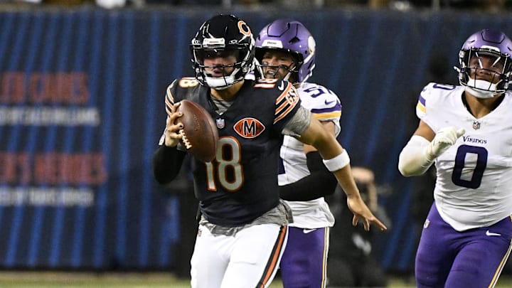 Chicago Bears quarterback Caleb Williams rushes the ball against the Minnesota Vikings during the second half at Soldier Field. Chicago Bears quarterback Caleb Williams rushes the ball against the Minnesota Vikings during the second half at Soldier Field.