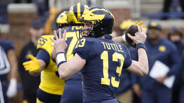 Apr 1, 2023; Ann Arbor, MI, USA; Michigan Wolverines quarterback Jack Tuttle (13) passes during the Spring Game at Michigan Stadium. Mandatory Credit: Rick Osentoski-USA TODAY Sports