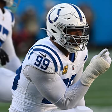 Nov 5, 2023; Charlotte, North Carolina, USA; Indianapolis Colts defensive tackle DeForest Buckner (99) reacts in the first quarter at Bank of America Stadium. 