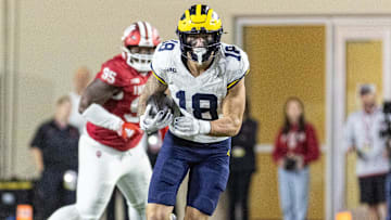 Nov 9, 2024; Bloomington, Indiana, USA; Michigan Wolverines tight end Colston Loveland (18) runs with the ball in the second half against the Indiana Hoosiers at Memorial Stadium. 