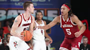 Nov 27, 2024; Paradise Island, Bahamas, BHS; Louisville Cardinals forward Noah Waterman (93) looks to score as Indiana Hoosiers forward Malik Reneau (5) defends during the second half at the Atlantis Resort.  Mandatory Credit: Kevin Jairaj-Imagn Images