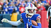 Nov 3, 2024; Orchard Park, New York, USA; Buffalo Bills wide receiver Keon Coleman (0) carries the ball after making a catch against the Miami Dolphins in the fourth quarter at Highmark Stadium. Mandatory Credit: Mark Konezny-Imagn Images
