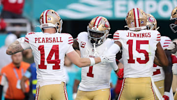 San Francisco 49ers wide receivers Ricky Pearsall (15), Deebo Samuel (1) and Jauan Jennings (15)