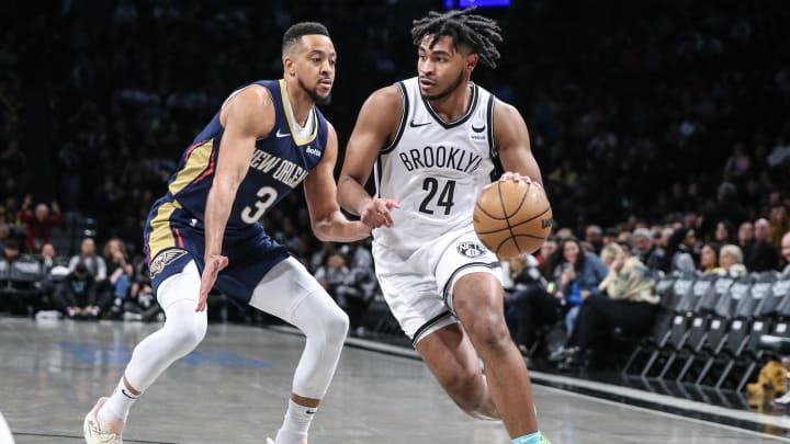 Mar 19, 2024; Brooklyn, New York, USA;  Brooklyn Nets guard Cam Thomas (24) drives past New Orleans Pelicans guard CJ McCollum (3) in the third quarter at Barclays Center. Mandatory Credit: Wendell Cruz-USA TODAY Sports