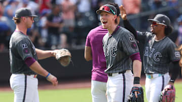 New York Mets third baseman Brett Baty celebrates with MLB teammates after defeating the Cincinnati Reds