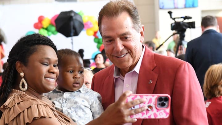 Nick Saban signs autographs, shakes hands, and poses for photos Wednesday, Aug. 14, 2024, at Bryant-Denny Stadium during the annual Nick’s Kids Foundation Luncheon.