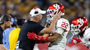 Houston Cougars head coach Willie Fritz celebrates a play with defensive back Marc Stampley II (22) against the Arizona State Sun Devils at Mountain America Stadium.