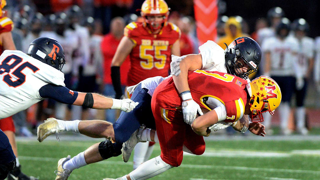 Rochester's Lance Ingold sacks Murphysboro quarterback Gibson Fager during the game Saturday, Nov. 18, 2023. Rochester's Lance Ingold sacks Murphysboro quarterback Gibson Fager during the game Saturday, Nov. 18, 2023.