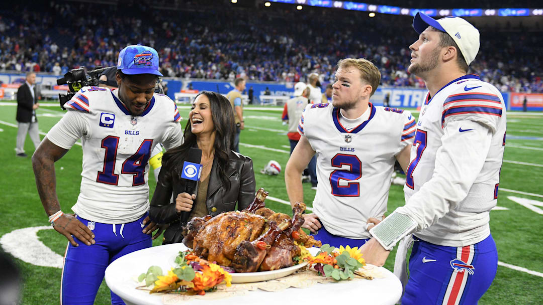 Nov 24, 2022; Detroit, Michigan, USA;  Buffalo Bills wide receiver Stefon Diggs (14) kicker Tyler Bass (2) and quarterback Josh Allen (17) talk with CBS reporter Tracy Wolfson after the Bills beat the Detroit Lions at Ford Field.