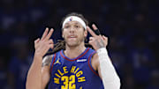 May 13, 2025; Oklahoma City, Oklahoma, USA; Denver Nuggets forward Aaron Gordon (32) gestures after scoring against the Oklahoma City Thunder during the second half of game five of the second round for the 2025 NBA Playoffs at Paycom Center. Mandatory Credit: Alonzo Adams-Imagn Images
