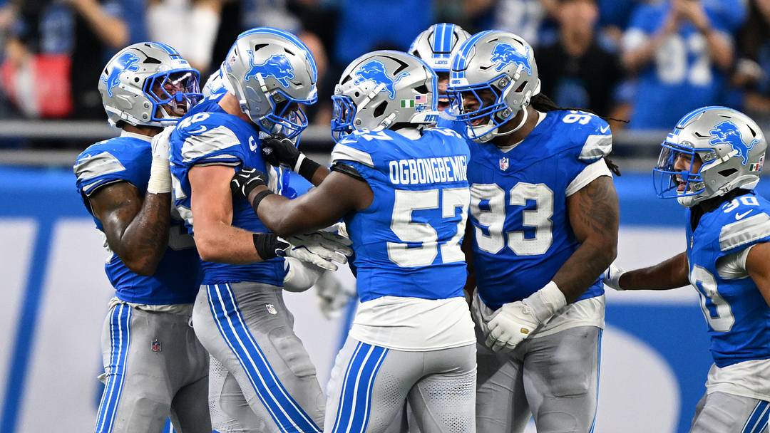 The Detroit Lions celebrate the win.