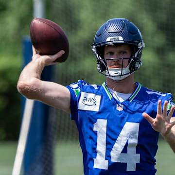 Jun 11, 2025; Renton, WA, USA; Seattle Seahawks quarterback Sam Darnold (14) passes the ball during mini-camp at Virginia Mason Athletic Center. 