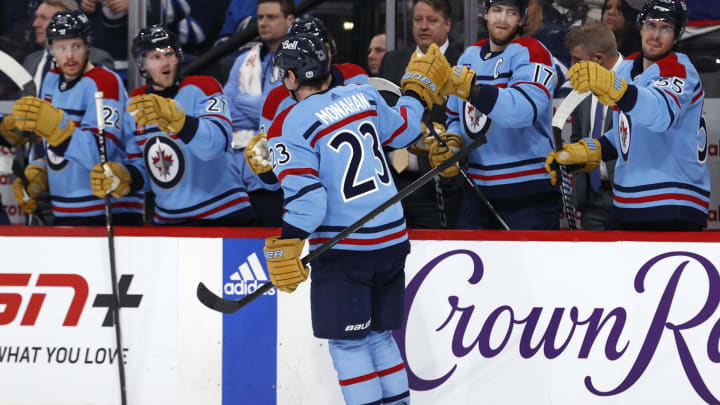 Apr 1, 2024; Winnipeg, Manitoba, CAN; Winnipeg Jets center Sean Monahan (23) celebrates his second period goal against the Los Angeles Kings at Canada Life Centre. Mandatory Credit: James Carey Lauder-USA TODAY Sports