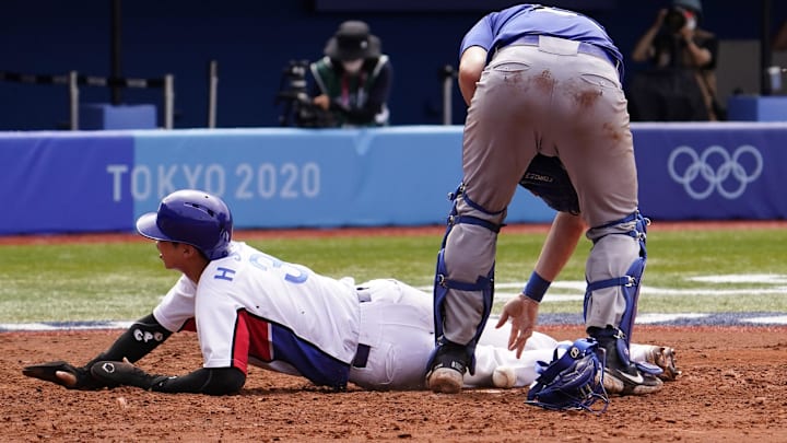 Aug 2, 2021; Yokohama, Japan; Team South Korea infielder Hyeseong Kim (3) scores a run past Team Israel catcher Ryan Lavarnway (36) during the Tokyo 2020 Olympic Summer Games at Yokohama Baseball Stadium. Mandatory Credit: Mandi Wright-Imagn Images