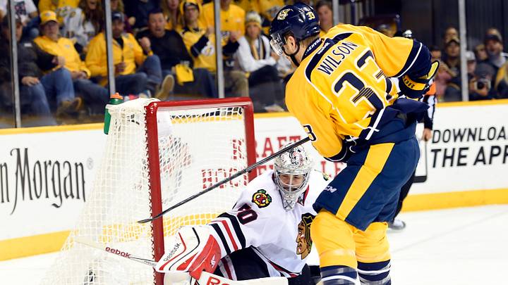 Apr 17, 2015; Nashville, TN, USA; Nashville Predators center Colin Wilson (33) has a shot blocked by Chicago Blackhawks goalie Corey Crawford (50) during the second period in game two of the first round of the the 2015 Stanley Cup Playoffs at Bridgestone Arena. Mandatory Credit: Christopher Hanewinckel-USA TODAY Sports Apr 17, 2015; Nashville, TN, USA; Nashville Predators center Colin Wilson (33) has a shot blocked by Chicago Blackhawks goalie Corey Crawford (50) during the second period in game two of the first round of the the 2015 Stanley Cup Playoffs at Bridgestone Arena. Mandatory Credit: Christopher Hanewinckel-USA TODAY Sports