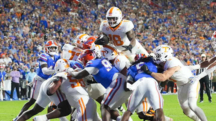 Tennessee running back DeSean Bishop (18) scores a touchdown during the NCAA college football game against Florida on November 22, 2025, in Gainesville, Florida.